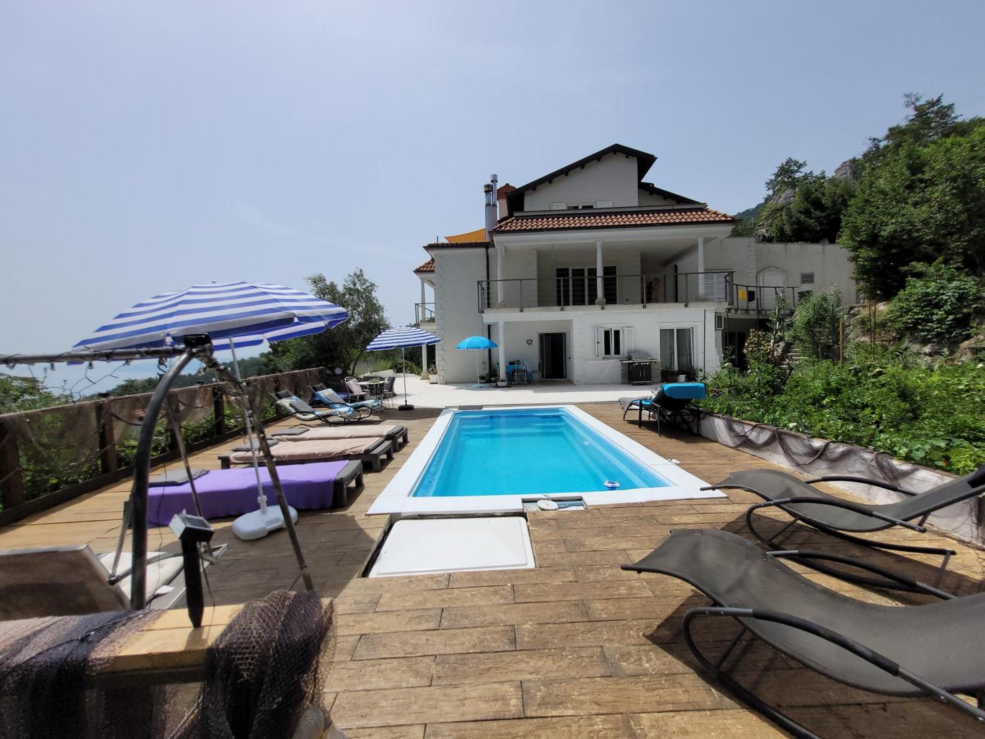 Apartments Chiara Mit Meerblick Und Pool Und Jacuzzi Ловран Экстерьер фото